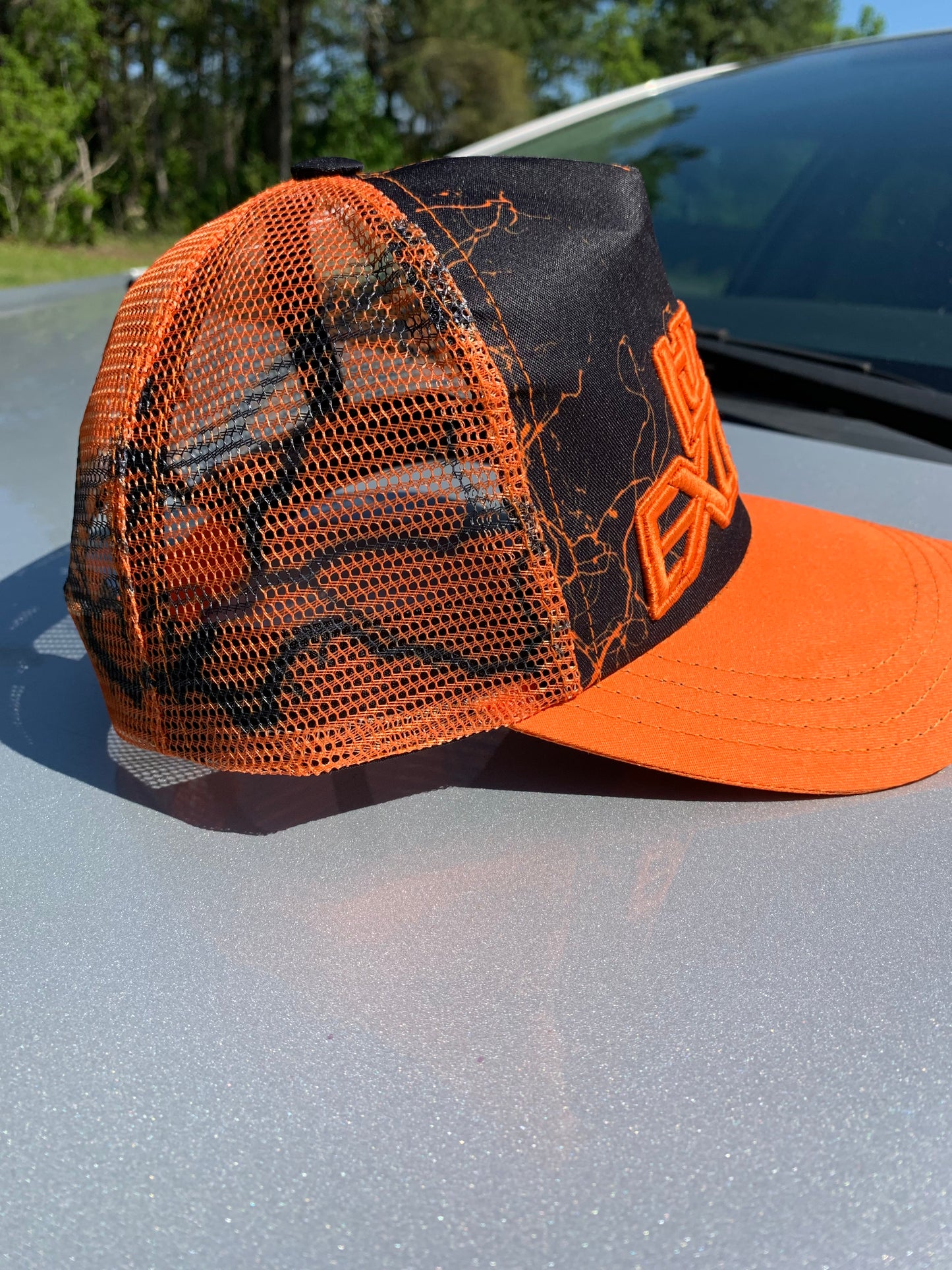 Hustle Exclusive Graphic "Dark Orange & Black" Trucker Hat