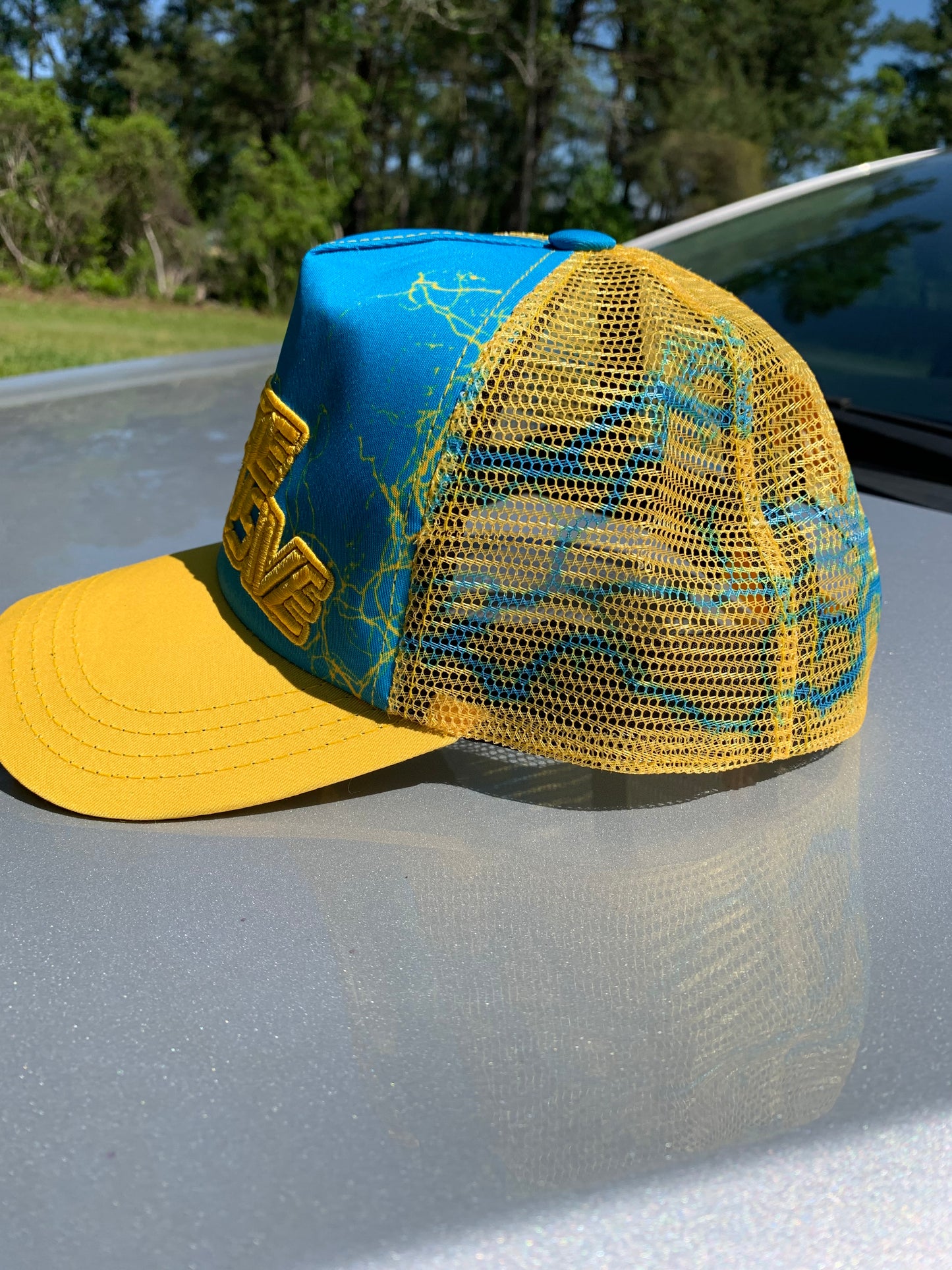 Hustle Exclusive Graphic "Teal & Yellow" Trucker Hat