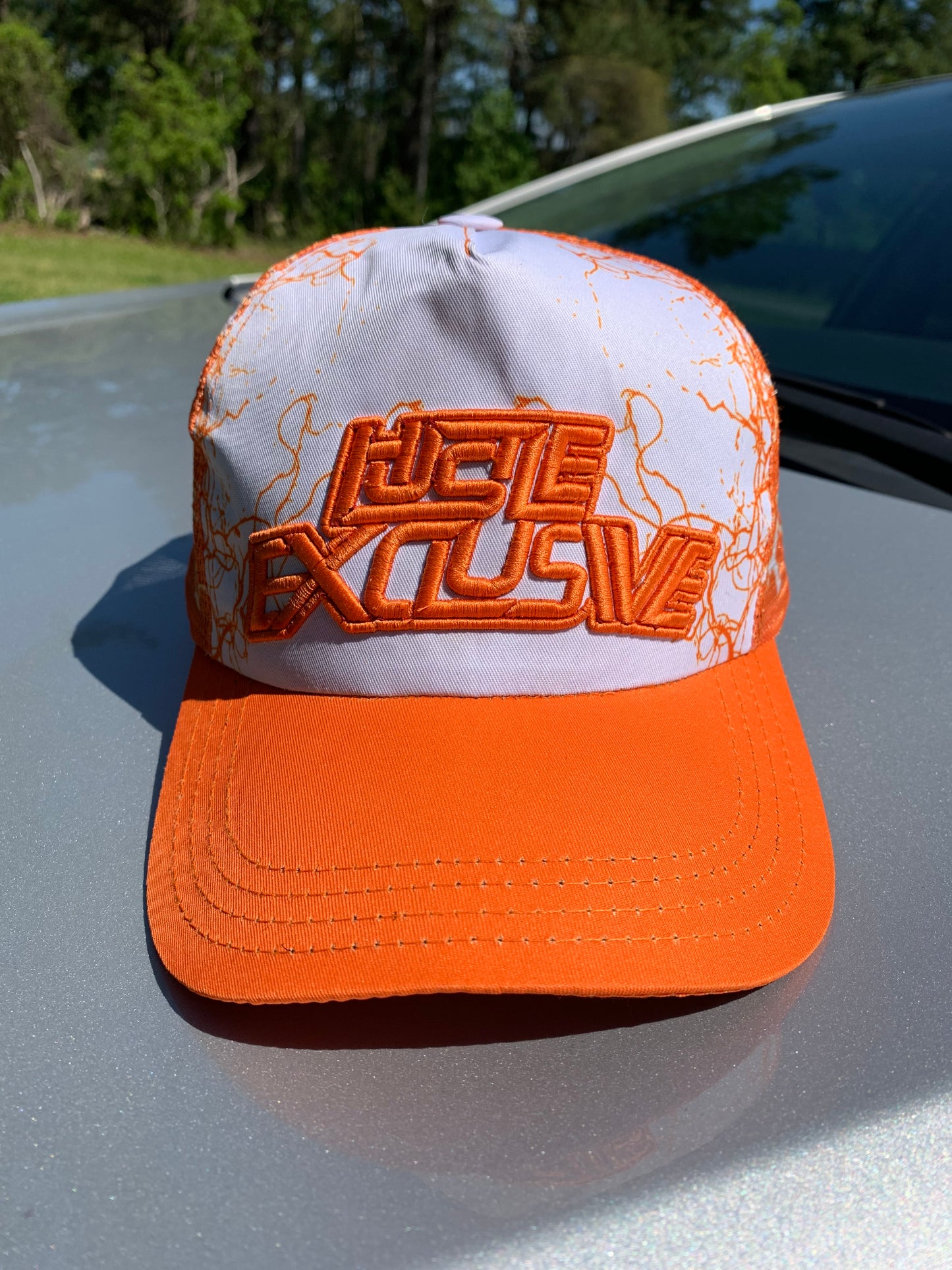 Hustle Exclusive Graphic "Bright Orange & White" Trucker Hat